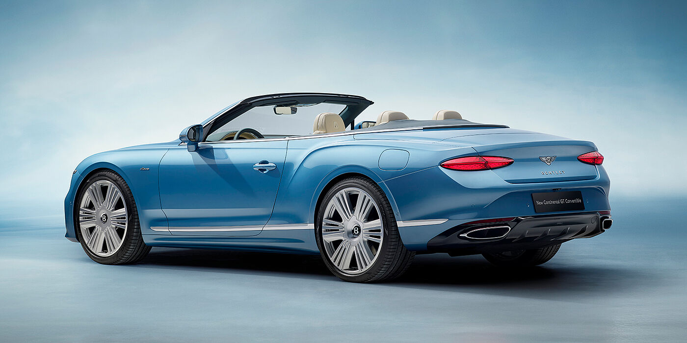 Bentley Birmingham New Bentley Continental GTC Azure convertible rear view in Light Windsor blue paint with 22 inch ten spoke wheels and chrome exterior details