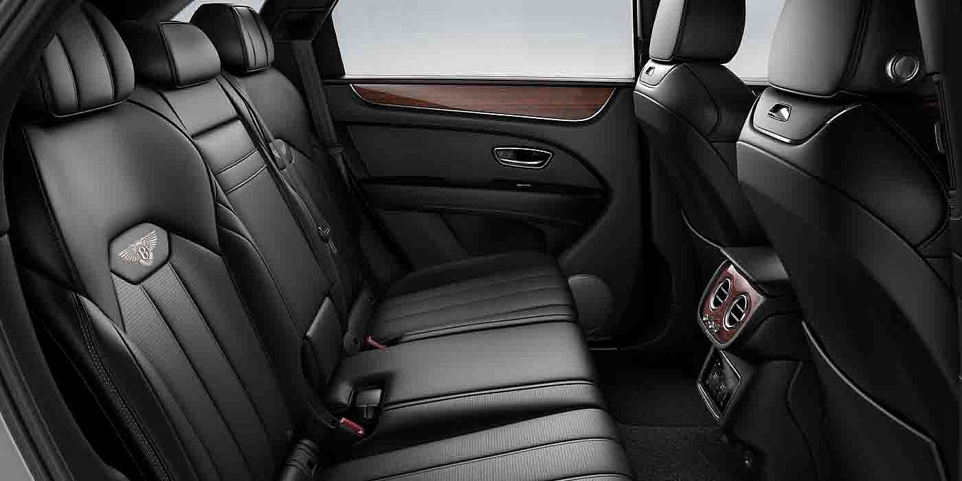 Bentley Birmingham Bentley Bentayga EWB interior view for rear passengers with Beluga black hide.