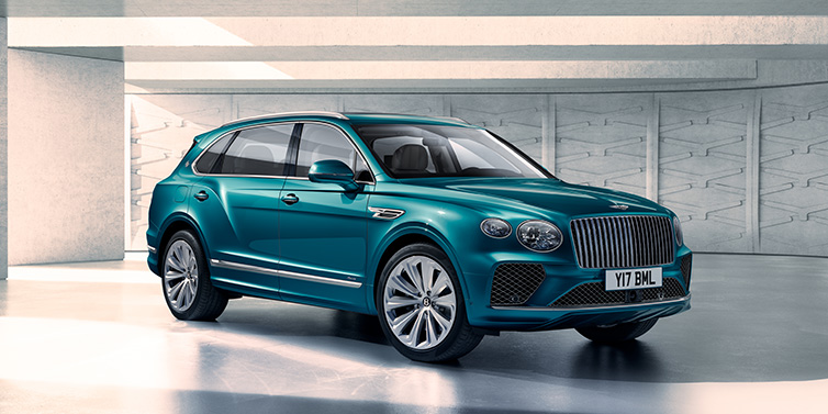 Bentley Birmingham Bentley Bentayga Extended Wheelbase Azure SUV front three quarter in Topaz blue paint colour with a grey background