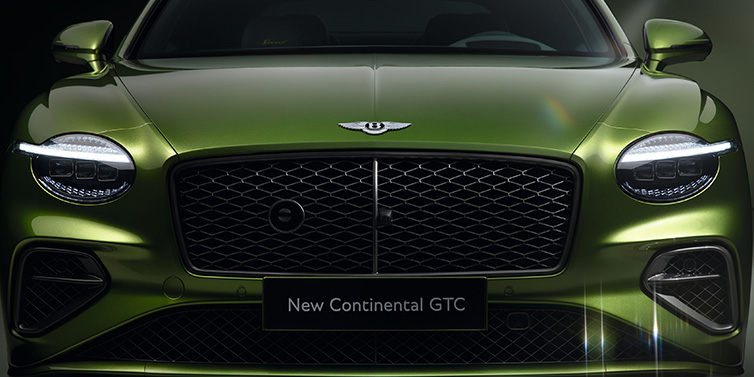 Bentley Birmingham Bentley Continental GTC Speed convertible front bonnet detail in Tourmaline Green paint showing new light design