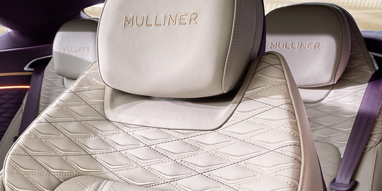 Bentley Birmingham Bentley Continental GT Mulliner coupe seat detail in Linen leather with Mulliner Diamond in Diamond quilting and Mulliner embroidered seat emblem